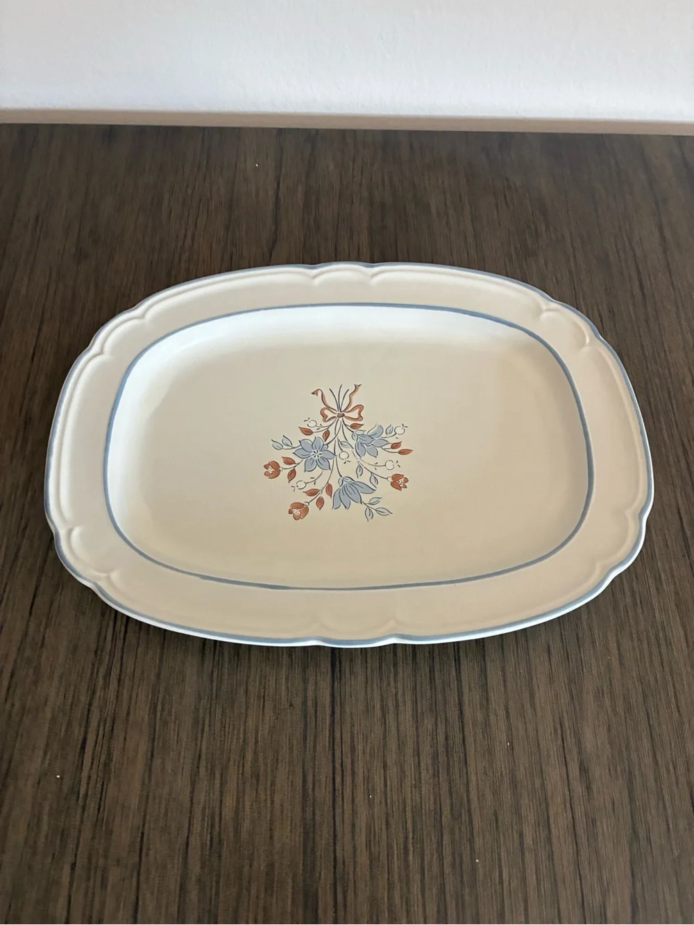 Cream Ceramic Serving Platter with Blue Rim and Orange Floral Accent